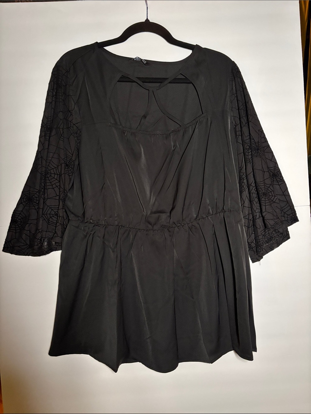 BloomChic Black Peplum Tunic with Lace Sleeves